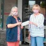 Pharmacy donates to Peninsula animal charity