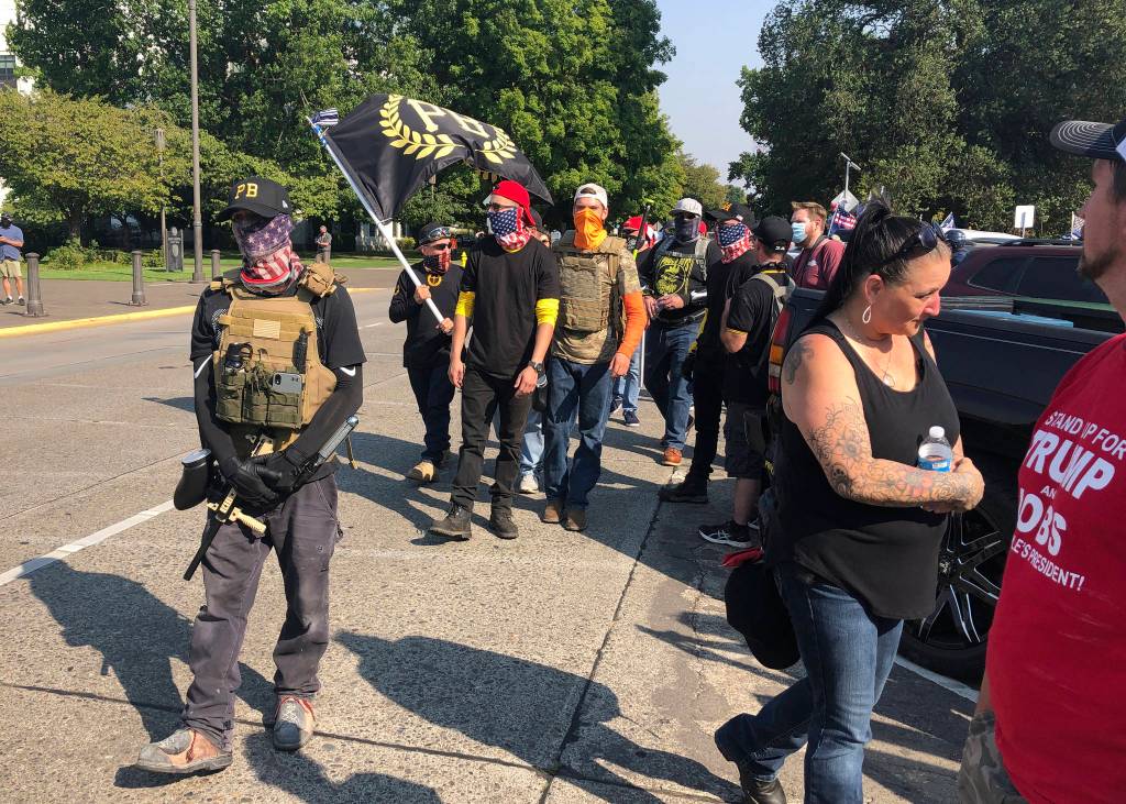 Members of the right-wing group the Proud Boys arrive in Salem, Ore., on Monday, Sept. 7, 2020, for a pro-Donald Trump rally at the Capitol. (Andrew Selsky/Associated Press)