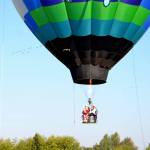 Cherie Kidd, Ms. Senior USA 2019-2020, left, and Captain-Crystal Stout, Ms. Senior Washington USA, film a promotional video from Stouts Dream Catcher balloon for the Ms. Senior USA pageant in October. (Matthew Nash/Olympic Peninsula News Group)