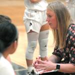 Peninsula College womens basketball coach Alison Crumb, right, speaks with her players during a game in February 2020. (Keith Thorpe/Peninsula Daily News file)