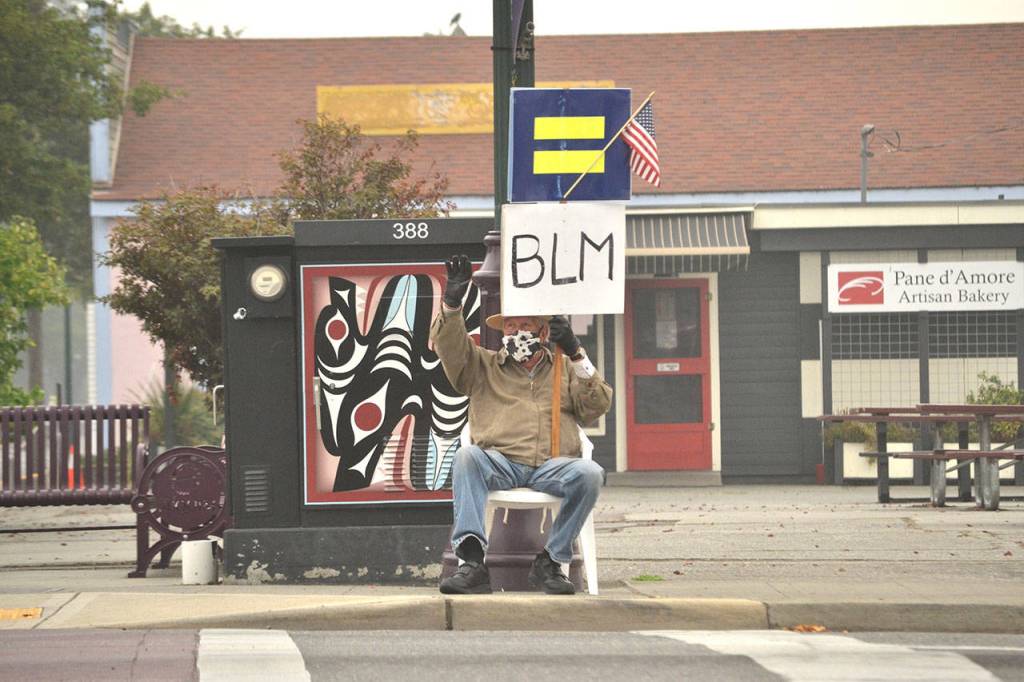 For more than 110 consecutive days, Sequims Neil Morris has set aside 3-plus hours to wave and hold signs showing his support for Black Lives Matter and the Human Rights Campaign. I just want people to be aware, Morris said. I dont know what else I could do. I piss off a lot of people and I think that is a good thing. (Matthew Nash/Olympic Peninsula News Group)