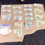 Detectives said they found 463.5 grams (just over 1 pound) of suspected methamphetamine with an approximate street value $18,500; 10.2 grams of suspected heroin with an estimated street value of $1,000; two rifles (one of which had previously been reported stolen); and $14,868 in cash. (Courtesy photo)