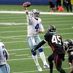 Dallas Cowboys quarterback Dak Prescott (4) throws a pass under pressure fro Atlanta Falcons linebacker Deion Jones (45) in the second half of an NFL football game in Arlington, Texas, Sunday, Sept. 20, 2020. (AP Photo/Ron Jenkins)