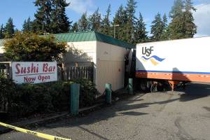 Semi rolls into pickup, eatery