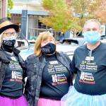 Wearing their tutus, just to add lightness to the proceedings, are, from left, Port Townsend Film Festival Executive Director Janette Force and popcorn sponsors Holley and Todd Carlson. (Diane Urbani de al Paz/for Peninsula Daily News)