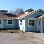 The exterior of the Recovery Cafe on the corner of Kearney and Blaine streets was repainted from black to the now light blue and white during its renovations. (Zach Jablonski/Peninsula Daily News)