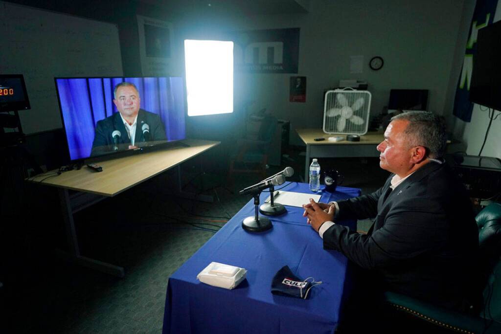Republican Loren Culp takes part in a sound check in the room he will be in for his debate with Washington Gov. Jay Inslee, a Democrat, on Wednesday, Oct. 7, 2020, in Olympia. (Ted S. Warren/Associated Press)