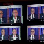 Washington gubernatorial candidates Gov. Jay Inslee, a Democrat, left, and Loren Culp, a Republican, right, are shown on a monitor in a video control room at the studios of TVW, Wednesday, Oct. 7, 2020, in Olympia, Wash., as they take part in a debate. Due to concerns over COVID-19, each candidate took part in the debate from individual rooms separate from moderators. (AP Photo/Ted S. Warren)