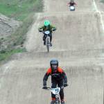Keith Thorpe/Peninsula Daily News Kids compete under the lights at the Lincoln Park BMX Track, the only outdoor track operating in western Washington.