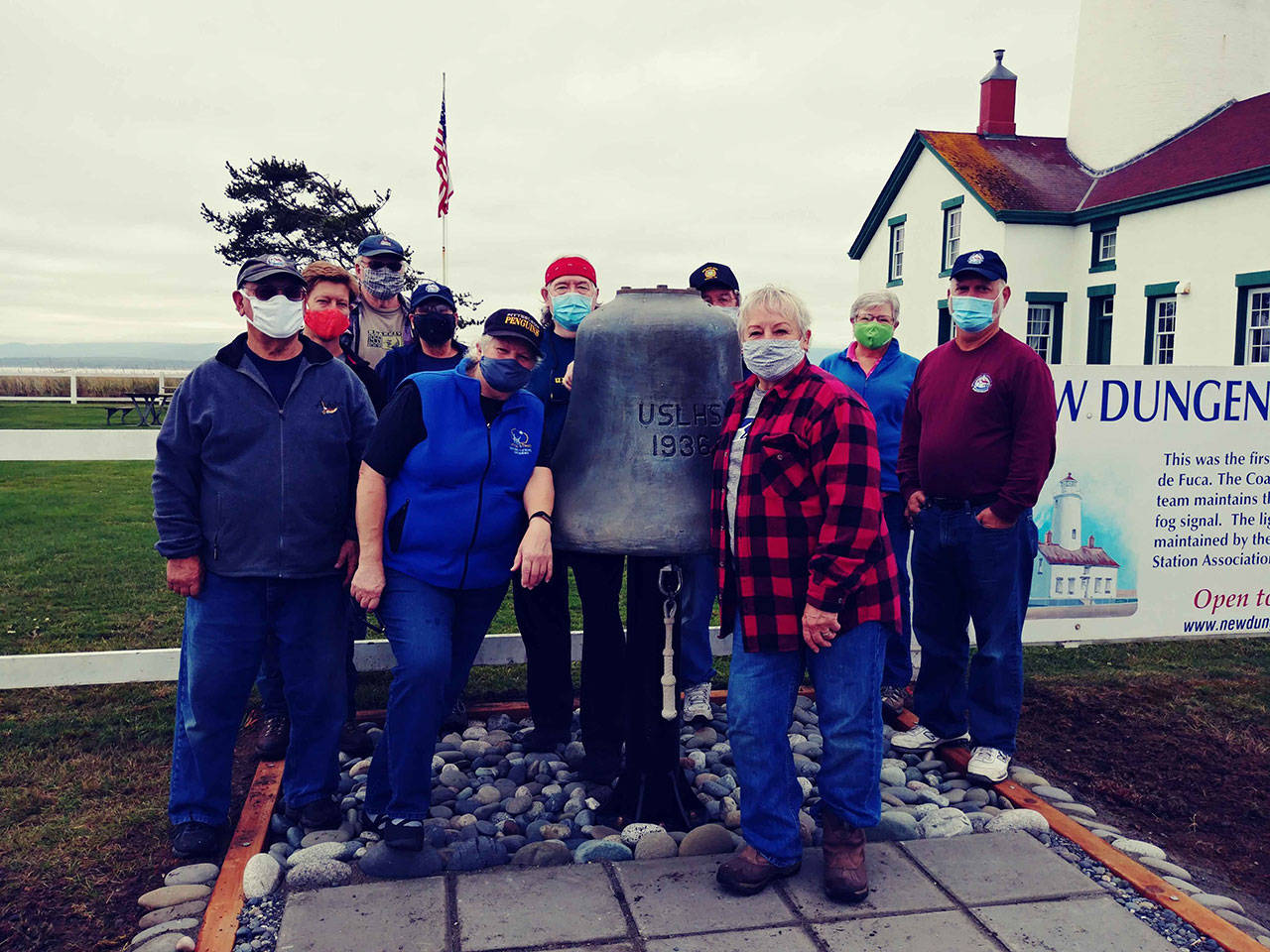 The volunteer work crew at the New Dungeness Lighthouse include, from left, Joe Bacher, Chad Kaiser, Bill Bjorklund, Sarah Miller, Melody Monson, Greg MacDonald, Ken Davidson, Julie Bacher, Nancy Klotz and Duane Klotz. Photo Marty LaMarr