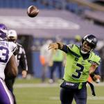 Seattle Seahawks quarterback Russell Wilson throws against the Minnesota Vikings during the second half of an NFL football game, Sunday, Oct. 11, 2020, in Seattle. (AP Photo/John Froschauer)