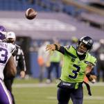 Seattle Seahawks quarterback Russell Wilson throws against the Minnesota Vikings during the second half of an NFL football game Sunday, Oct. 11, 2020, in Seattle. (John Froschauer/Associated Press)