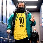 A photo Russell Wilson posted on his Twitter account of him wearing a Sue Bird jersey Sunday night before his game against the Vikings.