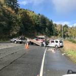 Washington State Patrol troopers clear the scene of a two-car injury collision on U.S. Highway 101 at Morse Creek in Port Angeles on Tuesday, Oct. 13, 2020. (Photo courtesy of Washington State Patrol)