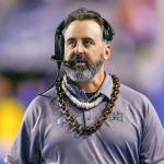 In this Saturday, Oct. 12, 2019, file photo, Hawaii head coach Nick Rolovich walks the sideline during the second half of an NCAA college football game against Boise State in Boise, Idaho. Nick Rolovich dived right in when Washington State hired him in January. Just when it seemed like things were up and rolling, the COVID-19 pandemic hit. The national shutdown hurt coaches across college football as they prepare for the 2020-21 season, but it was particularly difficult on programs with first-year coaches trying to build something new from the ground up. (Steve Conner/Associated Press file)