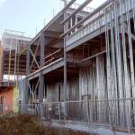 Work continues Wednesday, Oct. 14, 2020, at the site of the future Field Arts & Events Hall near the Port Angeles waterfront. A fundraising slowdown driven by the COVID-19 pandemic has forced organizers to indefinitely delay construction of the center in January. (Keith Thorpe/Peninsula Daily News)