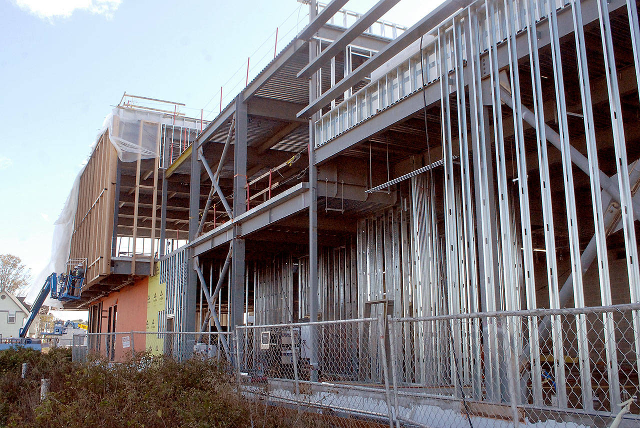 Work continues Wednesday, Oct. 14, 2020, at the site of the future Field Arts & Events Hall near the Port Angeles waterfront. A fundraising slowdown driven by the COVID-19 pandemic has forced organizers to indefinitely delay construction of the center in January. (Keith Thorpe/Peninsula Daily News)