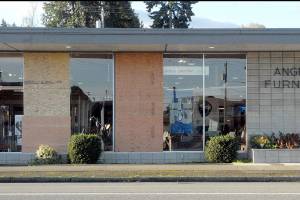 Keith Thorpe/Peninsula Daily NewsPlywood panels cover a pair of windows at Angeles Furniture and Mattress Co., 1114 E. First St., on Saturday in Port Angeles.