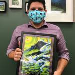 Tyler Johnson displays his United Way of Clallam County Live United award that features the artwork of Todd Fischer.The 2019 campaign chair, Johnson went above and beyond to help United Way reach the campaign goal, the organization said.