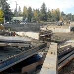 Crews work to replace the north portion of a set of culverts under U.S. Highway 101 at Bagley Creek east of Port Angeles. (Keith Thorpe/Peninsula Daily News)