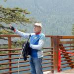 Jeff Bohman, president of the Peninsula Trails Coialition, speaks during Thursdays dedication ceremony for the new-renovated Daley-Rankin Tunnel and Spruce Railroad Trail. (Keith Thorpe/Peninsula Daily News)