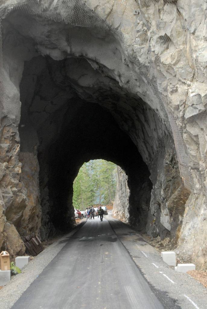 A paved trail runs through the newly-reopened Daley-Rankin Tunnel on the north shore of Lake Crescent. (Keith Thorpe/Peninsula Daily News)