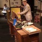 Curtis White readies a door sound effect for a Fibber McGee and Molly episode. (Photo courtesy of Olympic Theatre Arts)