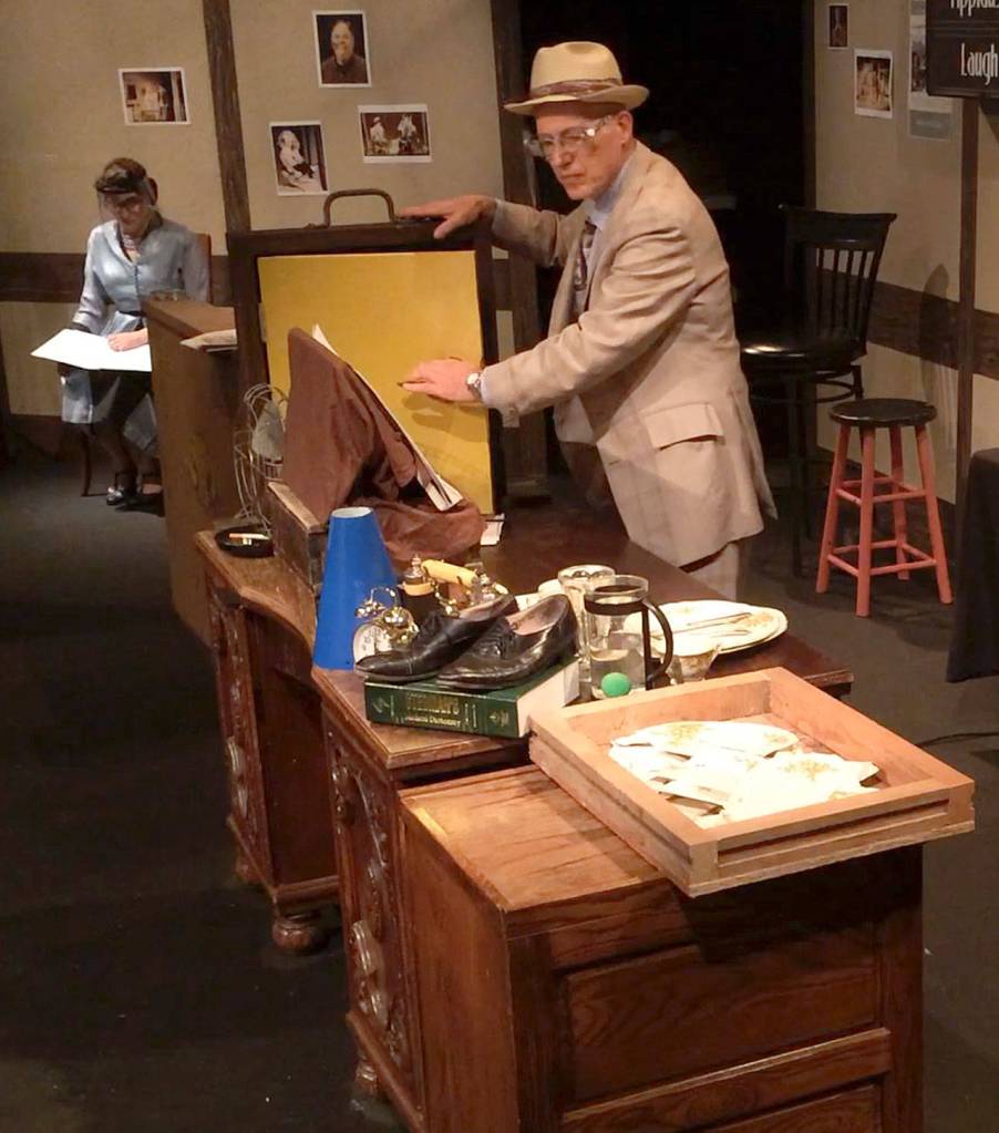 Curtis White readies a door sound effect for a Fibber McGee and Molly episode. (Photo courtesy of Olympic Theatre Arts)