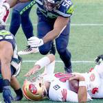San Francisco 49ers quarterback Jimmy Garoppolo reacts after he was sacked by Seattle Seahawks middle linebacker Bobby Wagner during the first half of an NFL football game, Sunday, Nov. 1, 2020, in Seattle. (AP Photo/Elaine Thompson)