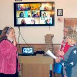 Pictured is Cynthia Bork, on left, being sworn in by Carol Weiler, also shown is Virginia Wagner.
