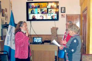 Pictured is Cynthia Bork, on left, being sworn in by Carol Weiler, also shown is Virginia Wagner.