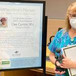 Dolores ‘Dee’ Cantlon, RN, receives a DAISY Award for exceptional nursing at Olympic Medical Center.
