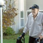 Keith Thorpe/Peninsula Daily News
Larry Owen, 97, stands outside the St. Andrew's Place Assisted Living Community in Port Angeles on Friday.