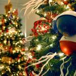Keith Thorpe/Peninsula Daily News
Lights and decorations adorn a tree on display at this weekend's Festival of Trees in Port Angeles.