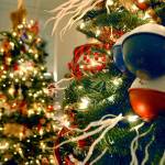 Lights and decorations adorn a tree on display at the 2019 Festival of Trees event in Port Angeles. This years event has been reorganized into a trio of fundraising events presented in a part virtual, part in-person format. (Keith Thorpe/Peninsula Daily News file)