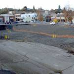 A hole left from the removal of several former buildings marks the site of a future luxury hotel to be built by the Lower Elwha Klallam Tribe in downtown Port Angeles. (Keith Thorpe/Peninsula Daily News)