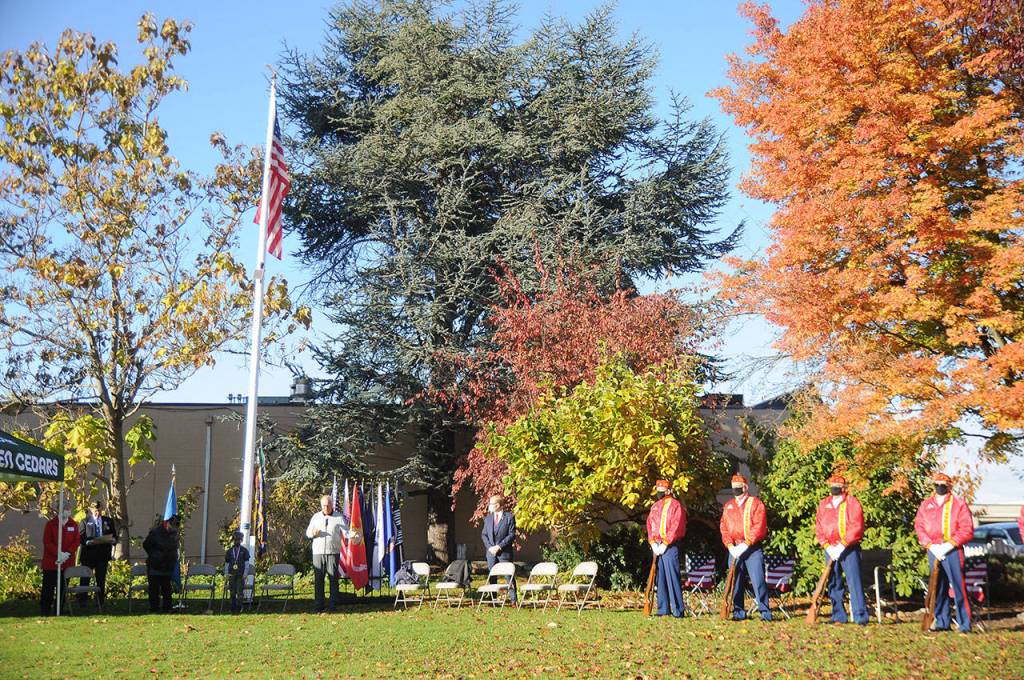 Tom Ferrell, a U.S. Air Force veteran and City of Sequim deputy mayor, addresses a crowd at a special Veterans Day ceremony at Pioneer Memorial Park. (Michael Dashiell/Olympic Peninsula News Group)