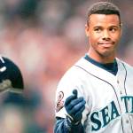 FILE - In this Oct. 13, 1995, file photo, Seattle Mariners Ken Griffey Jr. tosses his batting helmet after grounding out in the eighth inning against the Cleveland Indians in an ALCS game in Cleveland. The Seattle Mariners are the only baseball franchise never to advance to the Fall Classic. Baseball has never been played in Seattle beyond Oct. 22. The Mariners have three times been to the American League Championship Series, and all three times were sent home before there could ever be a Game 7. (AP Photo/Mark Duncan, File)