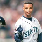In this Oct. 13, 1995, file photo, Seattle Mariners Ken Griffey Jr. tosses his batting helmet after grounding out in the eighth inning against the Cleveland Indians in an ALCS game in Cleveland. Griffey Jr. just joined the ownership group of the Seattle Sounders. (AP Photo/Mark Duncan, File)