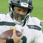 Seattle Seahawks quarterback Russell Wilson (3) scrambles against the Los Angeles Rams in the fourth quarter of an NFL football game in Inglewood, Calif., Sunday, Nov. 15, 2020. (Keith Birmingham/The Orange County Register via AP)