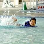 Jasper Cummins, 8, of Port Angeles practices his swimming skills on Saturday at the Shore Aquatic Center in Port Angeles. (Keith Thorpe/Peninsula Daily News)