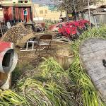 Former Clallam County Superior Court Judge Brian Coughenour is avoiding further code enforcement action by making satisfactory efforts to clean up his property along East Fifth Street in Port Angeles, according to city officials. (Paul Gottlieb/Peninsula Daily News)