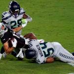 Arizona Cardinals wide receiver Andy Isabella (17) is hit by Seattle Seahawks middle linebacker Bobby Wagner (54) during the second half of an NFL football game Sunday, Oct. 25, 2020, in Glendale, Ariz. (Ross D. Franklin/Associated Press)