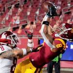 Southern California wide receiver Amon-Ra St. Brown, right, catches a touchdown over Washington State defensive back Armani Marsh during the first half of an NCAA college football game in Los Angeles, Sunday, Dec. 6, 2020. (AP Photo/Alex Gallardo)