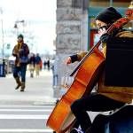 Downtown music making, such as that by cellist Sage Coy, has long been part of Port Townsend's cultural identity. Now, with the state officially naming a Creative District within the city, artists are invited to submit proposals for wayfinding art markers downtown, Uptown and at Fort Worden State Park. (Diane Urbani de la Paz/Peninsula Daily News)