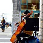 Downtown music making, such as that by cellist Sage Coy, has long been part of Port Townsends cultural identity. Now, with the state officially naming a Creative District within the city, artists are invited to submit proposals for wayfinding art markers downtown, Uptown and at Fort Worden State Park. (Diane Urbani de la Paz/Peninsula Daily News)