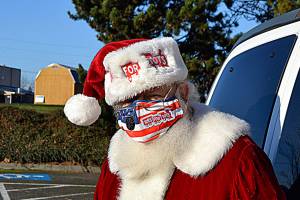 For 50 years, Diamond Point’s Don McIntyre has portrayed Santa Claus to benefit the U.S. Marine Corps Reserve Toys for Tots. While limited this year due to COVID-19, he plans to go at least another five years. (Matthew Nash/Olympic Peninsula News Group)