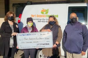 1st Security Bank recently donated $5,000 to the Port Angeles Food Bank, the donation was in addition to its annual food drive, 

The bank is currently accepting food and monetary donations for the food drive. 

According to a press release, the bank will match donations dropped off at its Eighth Street branch before the end of the year, the bank is located at 134 W. Eighth St., Port Angeles . 

Pictured, from left to right are Elisa Simonsen, 1st Security Bank branch manager; Annabelle Chesney-Lucero, Port Angeles Food Bank community engagement coordinator; Emily Dexter, Port Angeles Food Bank director; and Darrell Jenkins, 1st Security Bank business relationship manager.