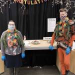 Jefferson County librarians Kim Tingelstad, left, and Scott Bahlmann earned masters degrees in library and information science. (Submitted photo)