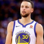 FILE - This March 6, 2018 file photo shows Golden State Warriors guard Stephen Curry during an NBA basketball game against the Brooklyn Nets in Oakland, Calif.  Sony Pictures Entertainment announced Monday, April 23, that it has struck a deal with the Golden State Warriors All-Star guard to produce television, film and possibly gaming projects. (AP Photo/Jeff Chiu, File)